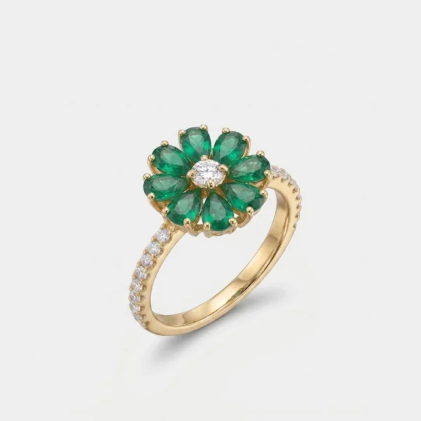 Dalù Anello in oro giallo con diamanti ct 0.18 e smeraldi